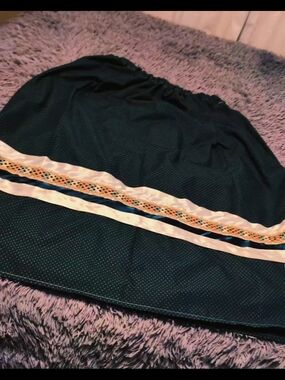 Dark Teal Native American Ribbon Skirt with Cream Satin Trim.